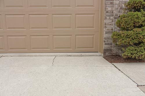 Uneven Garage Concrete in The Greater Tri-Cities Area